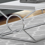 22inches x 44inches x 18.5inches White Metal  Coffee Table