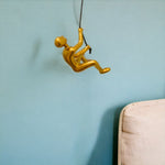 6inches x 3inches x 3inches Resin Gold Climbing Man