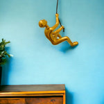 6inches x 3inches x 3inches Resin Gold Climbing Man
