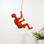 6inches x 3inches x 3inches Resin Red Climbing Man