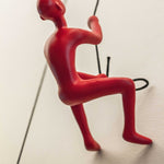 6inches x 3inches x 3inches Resin Red Climbing Man