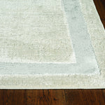 8'x11' Ivory Silver Machine Woven Bordered Indoor Area Rug