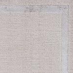 8'x11' Ivory Silver Machine Woven Bordered Indoor Area Rug