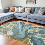 7'x10' Teal Blue Machine Woven Watercolor Indoor Area Rug